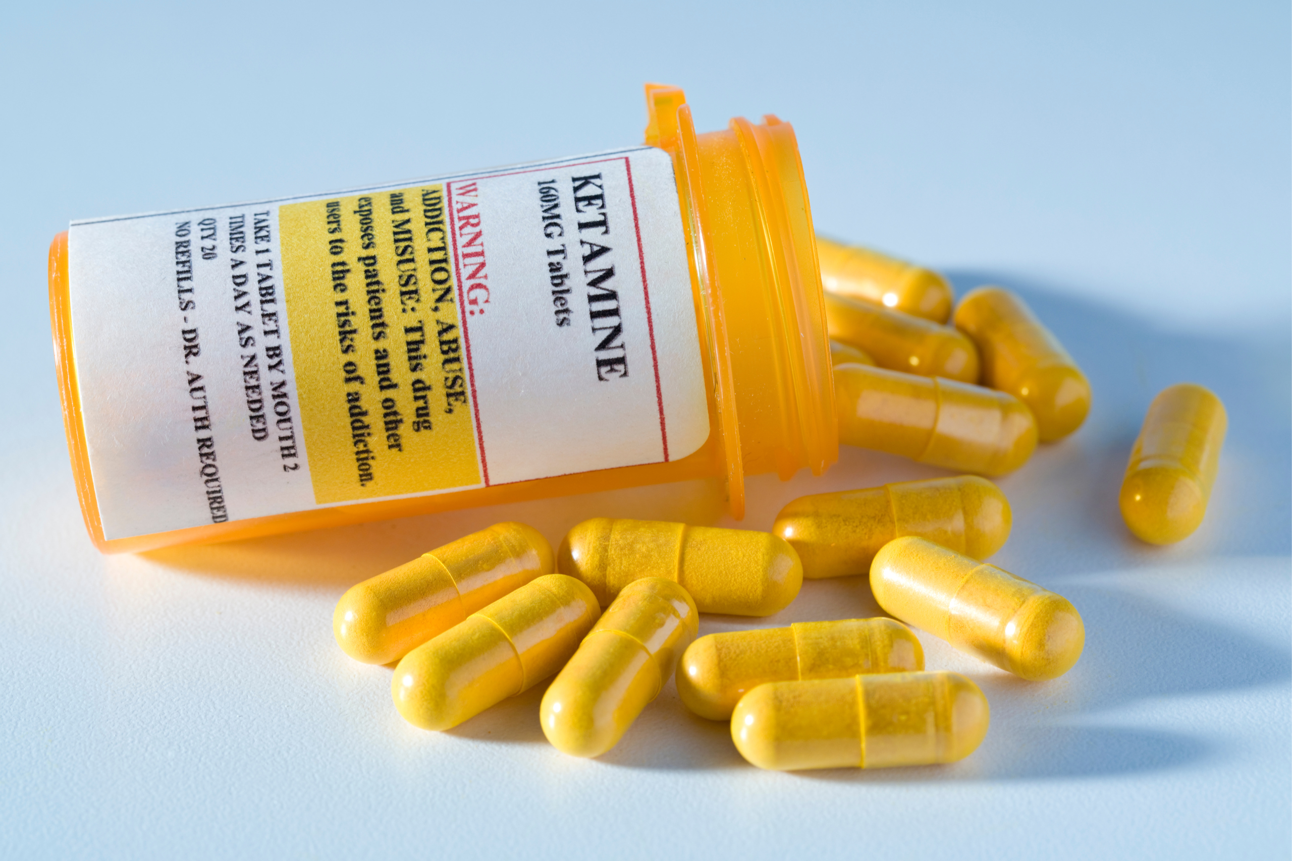 A poured-out pill bottle of ketamine.