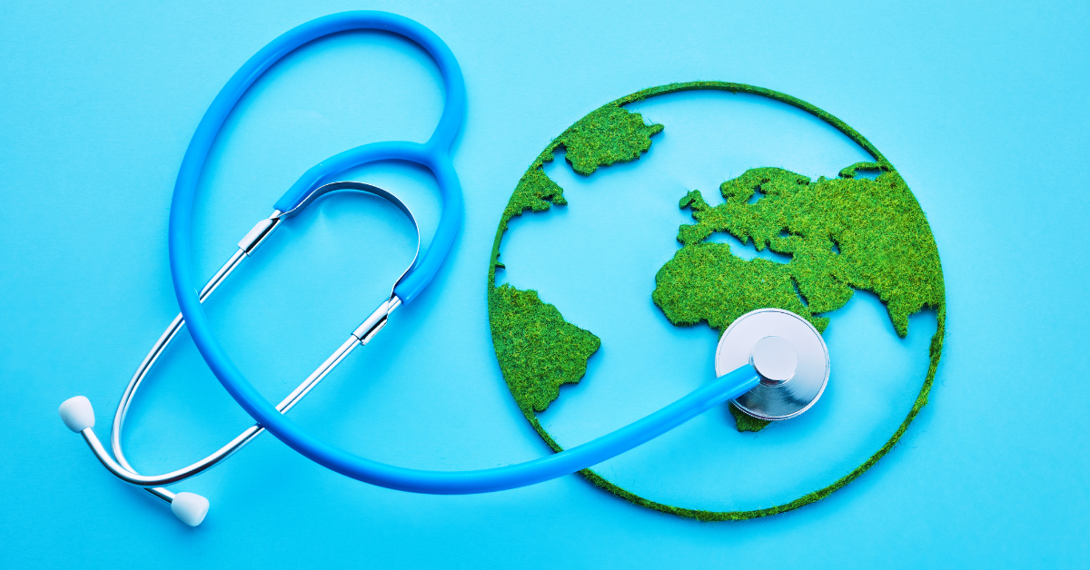 A stethoscope is placed next to an image of the earth.